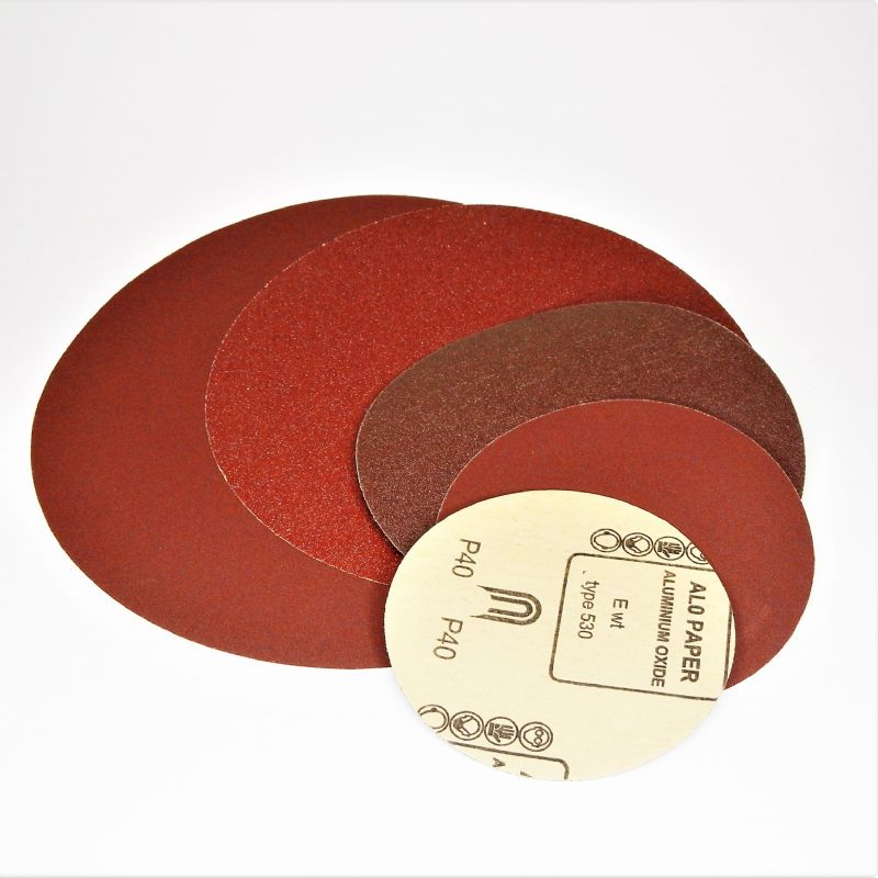 dischi abrasivi in carta resinata rossa pesante tranciati d. mm. 400 p 320 a tipo corindone