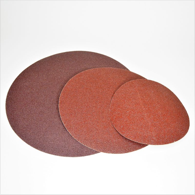 dischi abrasivi in tela resinata rossa pesante + adesivo tranciati d. mm. 600 p 400 a tipo corindone