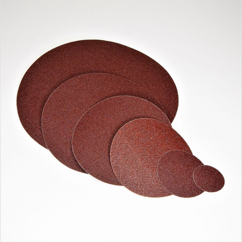 dischi abrasivi in tela resinata rossa robusta tranciati d. mm. 700 p 150 a tipo corindone